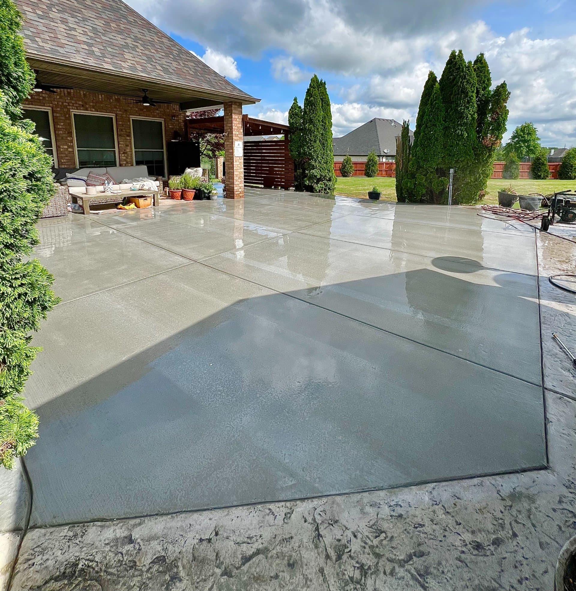 Finished concrete patio poured by Pristine Concrete in Northwest Arkansas