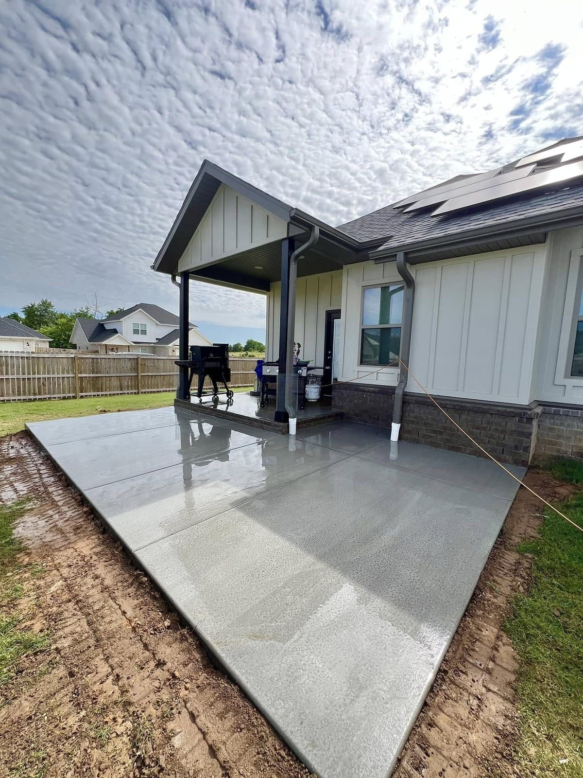 Backyard concrete slab installation by Pristine Concrete in Northwest Arkansas