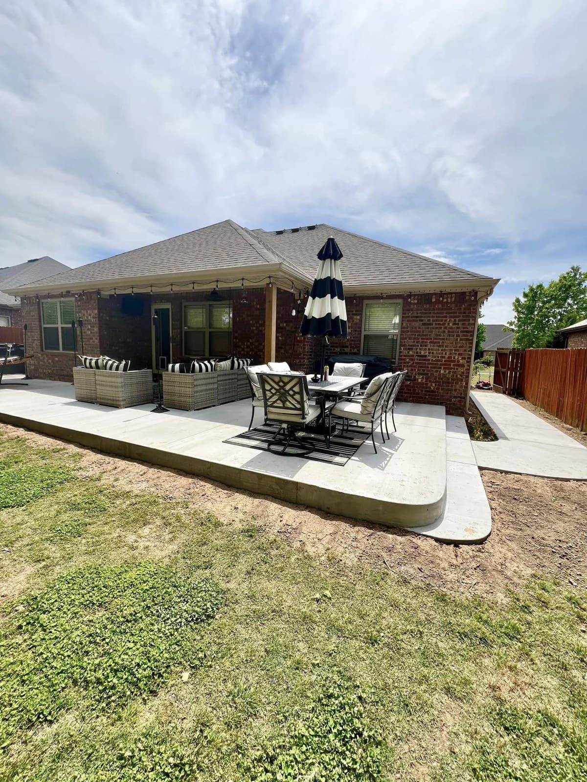 Newly installed concrete walkway by Pristine Concrete in Northwest Arkansas